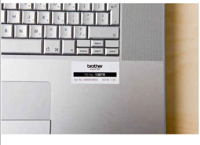 tape label maker ,0.94 w, black on white TZE-251